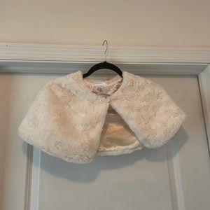 Very soft, worn over dresses